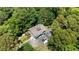 Overhead view of home with attached garage and well maintained grounds at 200 Mcclure Dr, Cumming, GA 30028