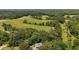 Home with expansive land and mature trees at 200 Mcclure Dr, Cumming, GA 30028