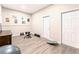 The unfinished basement has light vinyl flooring, neutral walls and large open spaces at 200 Mcclure Dr, Cumming, GA 30028