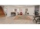 A finished basement featuring durable floors, carpet, furniture, stairs, and a neutral color palette at 200 Mcclure Dr, Cumming, GA 30028