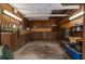 A rustic garage with concrete floors, perfect for storage or workshop space at 200 Mcclure Dr, Cumming, GA 30028