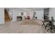 This large living room has LVP floors and access to the backyard at 200 Mcclure Dr, Cumming, GA 30028