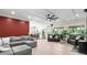 Expansive living room with ceiling fan, recessed lighting, and hardwood flooring throughout at 200 Mcclure Dr, Cumming, GA 30028