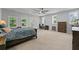 Spacious bedroom with neutral carpet, a ceiling fan, with lots of room for a home office at 200 Mcclure Dr, Cumming, GA 30028