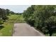 Well-maintained riding arena adjacent to lush green pastures at 200 Mcclure Dr, Cumming, GA 30028