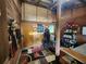Tack room featuring storage shelves, riding equipment and accessories at 200 Mcclure Dr, Cumming, GA 30028