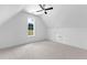 Large bedroom with bright walls, plush carpeting, and natural light from large window at 208 Regester Way, Peachtree City, GA 30269