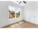 Empty bedroom featuring natural light and hardwood floors at 208 Regester Way, Peachtree City, GA 30269