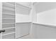A walk-in closet with shelving and rods, providing ample storage at 208 Regester Way, Peachtree City, GA 30269