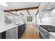 Spacious kitchen features an island, stainless steel appliances, and an open floor plan at 208 Regester Way, Peachtree City, GA 30269