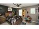 Brooklyn Nets-themed bedroom with a ceiling fan, gray walls, and sports-themed decor at 354 Jada Ln, Villa Rica, GA 30180