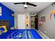 Golden State Warriors-themed bedroom features gray walls, blue accent wall, and sporty decor at 354 Jada Ln, Villa Rica, GA 30180