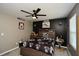 Brooklyn Nets-themed bedroom featuring a ceiling fan, sporty decorations, and gray walls at 354 Jada Ln, Villa Rica, GA 30180