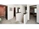 Bright hallway with freshly painted white walls, dark trim, and neutral carpet throughout the upper level of the home at 354 Jada Ln, Villa Rica, GA 30180