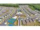 An aerial view of the community featuring homes, landscaping, a clubhouse, pool, and tennis courts at 427 Bluffs View Ln, Canton, GA 30114