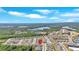 Beautiful aerial view of a neighborhood with lush landscaping and a stunning lake nearby at 427 Bluffs View Ln, Canton, GA 30114