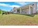 Lush backyard with covered patio, perfect for outdoor relaxation and entertaining at 427 Bluffs View Ln, Canton, GA 30114