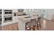 Well-appointed kitchen with stainless steel appliances, granite counters, and a breakfast bar with seating at 427 Bluffs View Ln, Canton, GA 30114