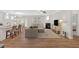 Open-concept living space with modern furnishings, a cozy fireplace, and great flow at 427 Bluffs View Ln, Canton, GA 30114