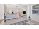 Comfortable main bedroom with ensuite area, dresser, and carpet floors at 427 Bluffs View Ln, Canton, GA 30114