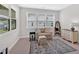 Bright sitting area with large windows and neutral decor at 427 Bluffs View Ln, Canton, GA 30114