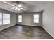 Spacious bedroom with laminate flooring, natural light, and neutral tones, creating a serene retreat at 1575 Wynfield Dr, Auburn, GA 30011