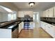 Well-equipped kitchen with stainless steel appliances, granite countertops, and ample cabinet space at 1575 Wynfield Dr, Auburn, GA 30011