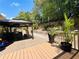 Relaxing back deck featuring a gazebo and elegant patio furniture, ideal for outdoor entertainment and serene lounging at 1739 Praters Pt, Dacula, GA 30019