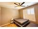 Comfortable bedroom with neutral walls, plush carpet, and white shuttered windows at 1739 Praters Pt, Dacula, GA 30019