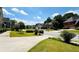 Suburban street view with well-maintained lawns, trees, and residential houses at 1739 Praters Pt, Dacula, GA 30019