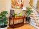 Inviting foyer with hardwood floors, staircase, and elegant decor at 1739 Praters Pt, Dacula, GA 30019