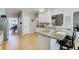 Kitchen features granite countertops, a breakfast bar and stainless appliances at 1739 Praters Pt, Dacula, GA 30019