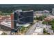 Aerial exterior view of medical building on a street and among trees at 1820 Peachtree St # 311, Atlanta, GA 30309
