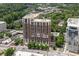 Upscale condo with surrounding buildings, trees, and parking at 1820 Peachtree St # 311, Atlanta, GA 30309