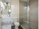 Modern bathroom with a sink, toilet, and shower, featuring tiled walls and contemporary fixtures at 1820 Peachtree St # 311, Atlanta, GA 30309