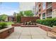 Courtyard with garden, shrubs, fountains and seating area at 1820 Peachtree St # 311, Atlanta, GA 30309