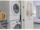 Convenient laundry area with stacked washer and dryer, storage options, and easy access at 1820 Peachtree St # 311, Atlanta, GA 30309