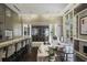 Resident lounge area with fireplace, sofas, chairs, and kitchen at 1820 Peachtree St # 311, Atlanta, GA 30309