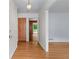 Inviting entryway with hardwood floors, showcasing seamless transition to the home's interior at 2655 Hayden Dr, East Point, GA 30344