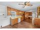 Spacious kitchen features wooden cabinets and hardwood floors at 2655 Hayden Dr, East Point, GA 30344
