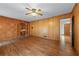 Living room featuring hardwood floors and wood paneling at 2655 Hayden Dr, East Point, GA 30344