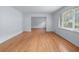 Bright and airy living room featuring hardwood floors and a large window, creating a welcoming space at 2655 Hayden Dr, East Point, GA 30344