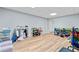 Spacious basement with wood-look flooring and plenty of room for storage and activities at 3370 Ashton Dr, Suwanee, GA 30024