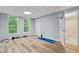 Finished basement with windows for natural light, and accessible bathroom at 3370 Ashton Dr, Suwanee, GA 30024