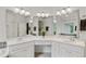 Bright bathroom featuring a soaking tub, glass enclosed shower, and dual sinks at 3370 Ashton Dr, Suwanee, GA 30024