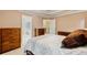 Spacious main bedroom featuring neutral tones and a view into the luxurious ensuite bathroom at 3370 Ashton Dr, Suwanee, GA 30024