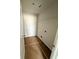 Walk-in closet with white walls and wire shelving. There are uninstalled washer/dryer hookups at 11594 E Lovejoy Rd, Hampton, GA 30228
