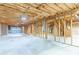 Unfinished basement with open ceiling and insulated walls at 1210 Lancelot Ct, Loganville, GA 30052
