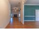 Inviting foyer with hardwood floors, leading to a spacious living area with a fireplace and ample natural light at 1210 Lancelot Ct, Loganville, GA 30052