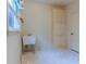 A laundry room with built-in storage and white cabinets at 1210 Lancelot Ct, Loganville, GA 30052